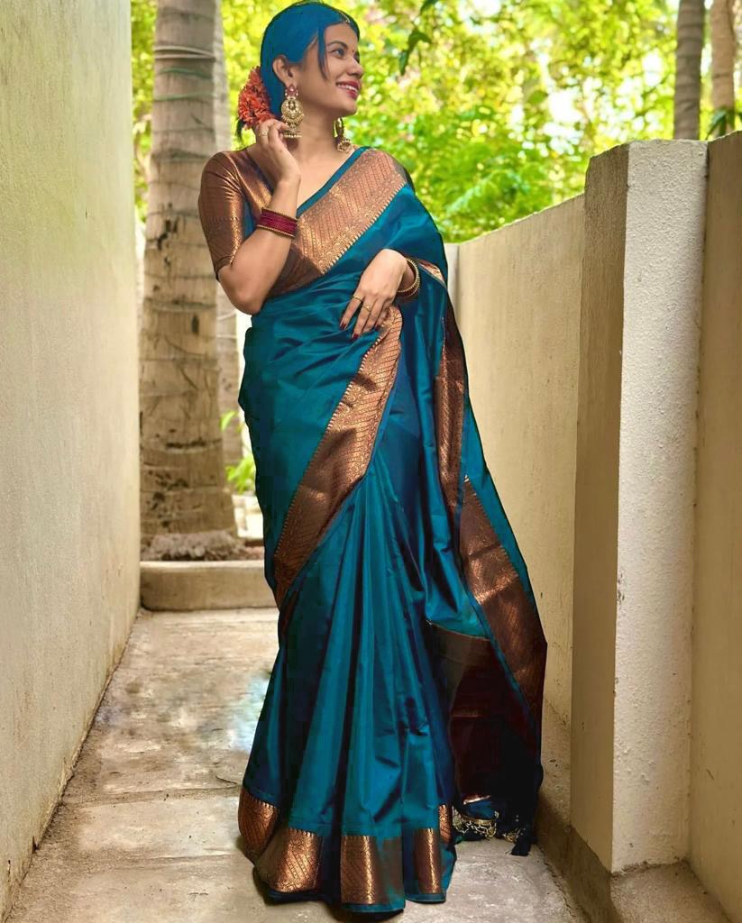 Snazzy Rama Soft Silk Saree With Magnetic Blouse Piece ClothsVilla Main image