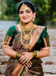 Load image into Gallery viewer, Arresting Dark Green Soft Silk Saree With Impressive Blouse Piece ClothsVilla