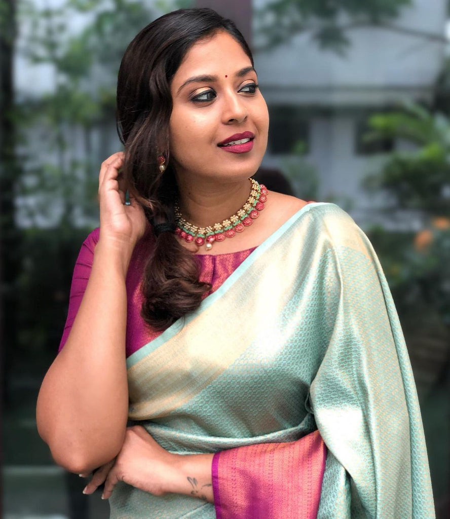 A glam Sea Green Soft Banarasi Silk Saree With Adoring Blouse Piece ClothsVilla