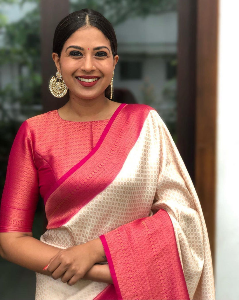 Flamboyant Off White Silk Saree with Gold Blouse