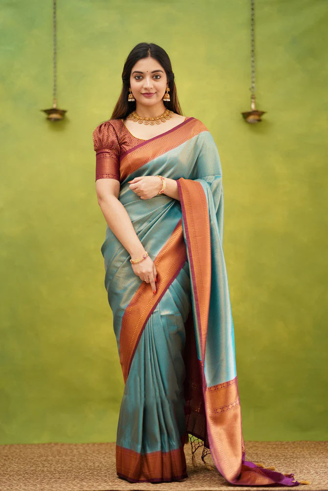 Embrocation Firozi Soft Banarasi Silk Saree With Ephemeral Blouse Piece ClothsVilla