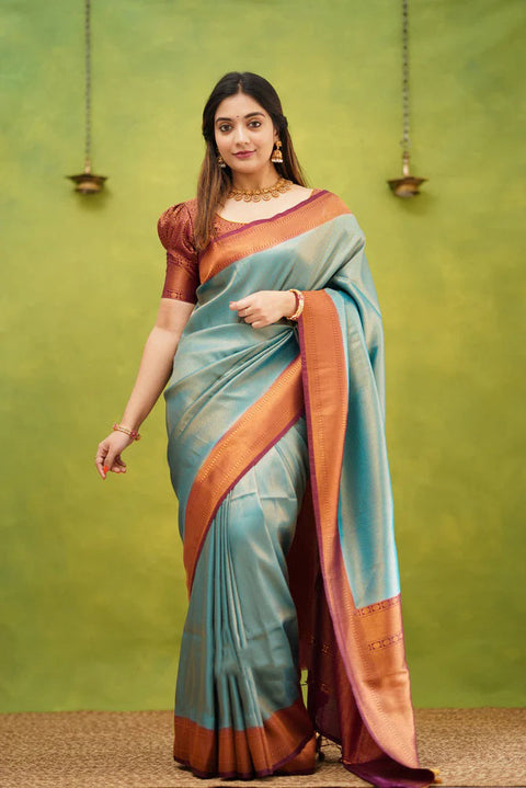 Embrocation Firozi Soft Banarasi Silk Saree With Ephemeral Blouse Piece ClothsVilla Main image