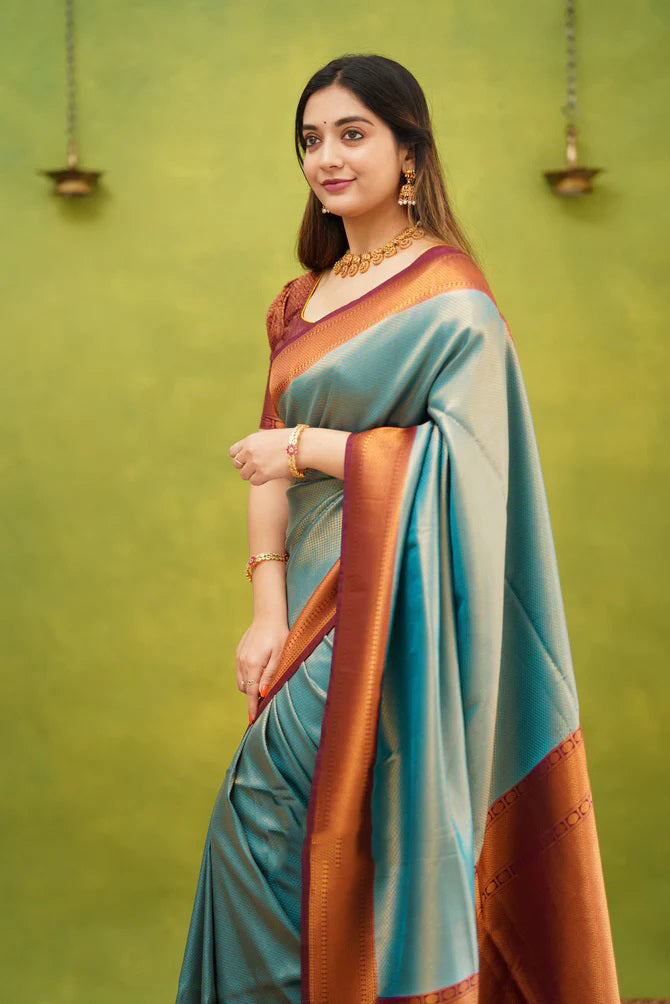 Embrocation Firozi Soft Banarasi Silk Saree With Ephemeral Blouse Piece ClothsVilla