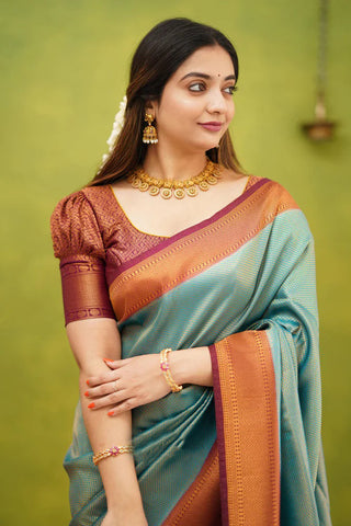 Embrocation Firozi Soft Banarasi Silk Saree With Ephemeral Blouse Piece ClothsVilla
