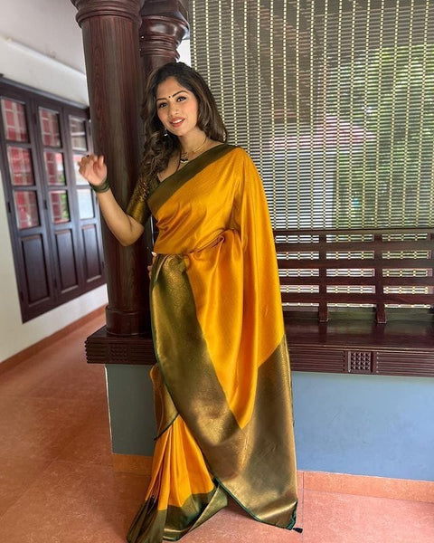 Bewitching Yellow Soft Silk Saree with Lissome Blouse Piece ClothsVilla Main image