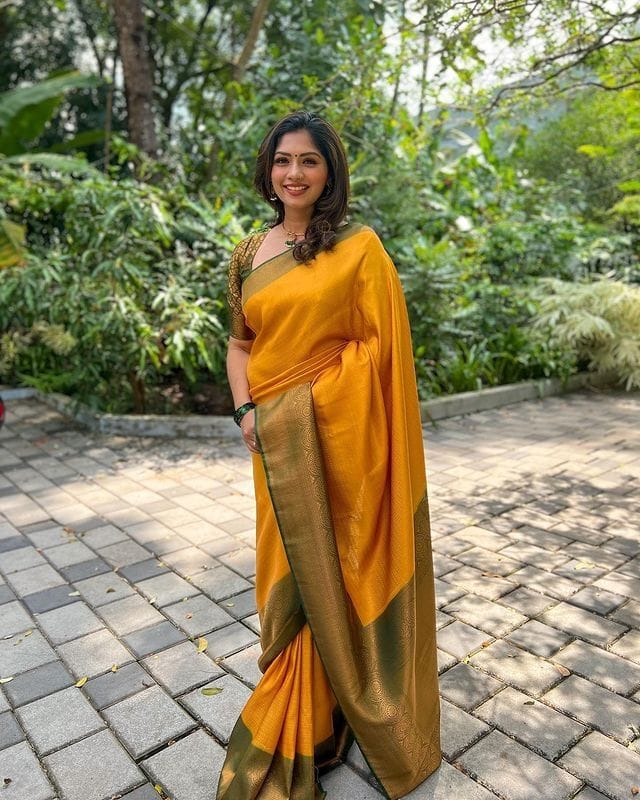 Bewitching Yellow Soft Silk Saree with Lissome Blouse Piece ClothsVilla