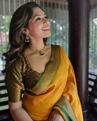 Bewitching Yellow Soft Silk Saree with Lissome Blouse Piece ClothsVilla