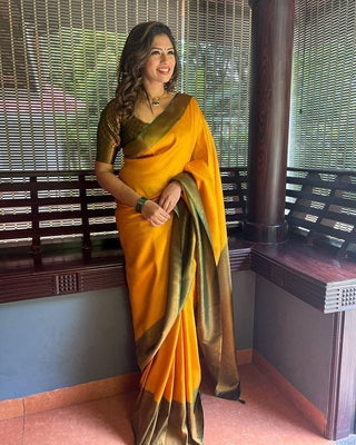 Bewitching Yellow Soft Silk Saree with Lissome Blouse Piece ClothsVilla