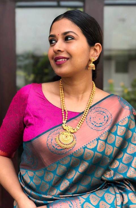 Gleaming Rama Soft Banarasi Silk Saree With Dazzling Blouse Piece ClothsVilla