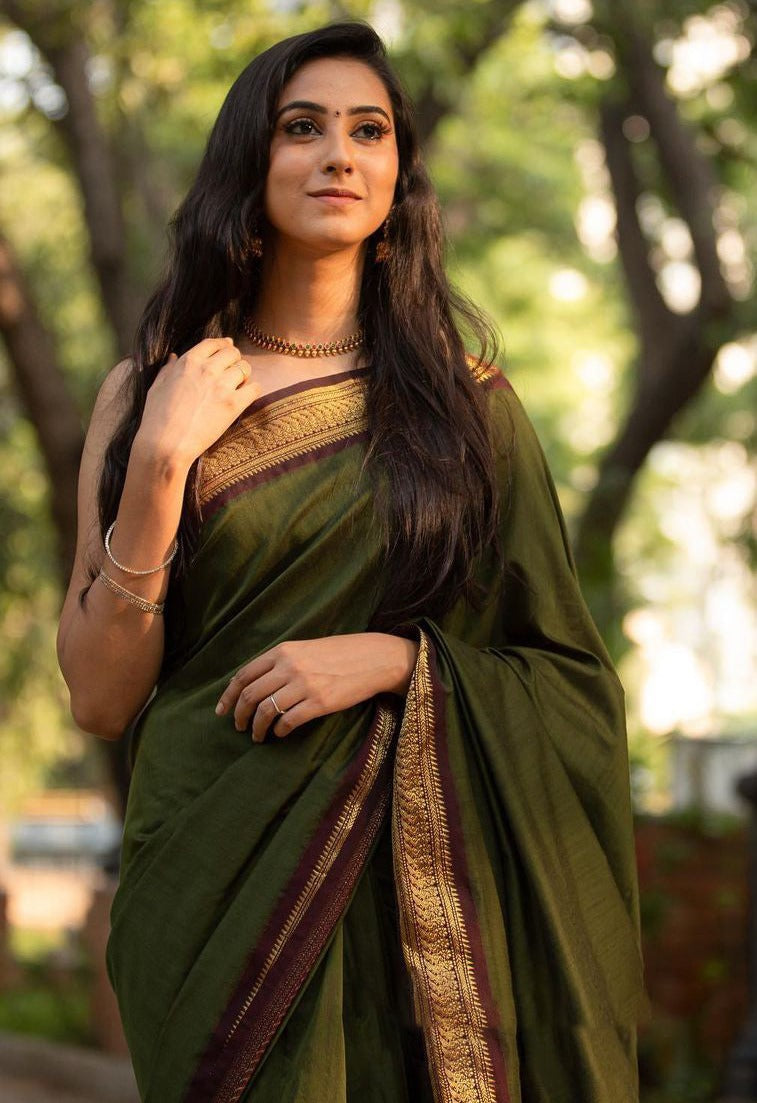 Elaborate Green Soft Banarasi Silk Saree With Proficient Blo