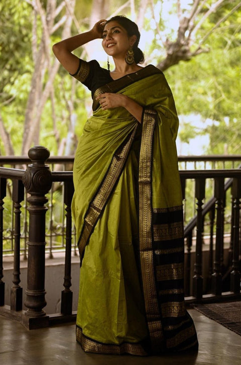 Glittering Mehndi Soft Banarasi Silk Saree With Unequalled Blouse Piece ClothsVilla Main image