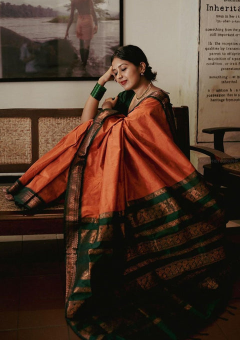 Prominent Orange Soft Banarasi Silk Saree With Flamboyant Blouse Piece ClothsVilla Main image