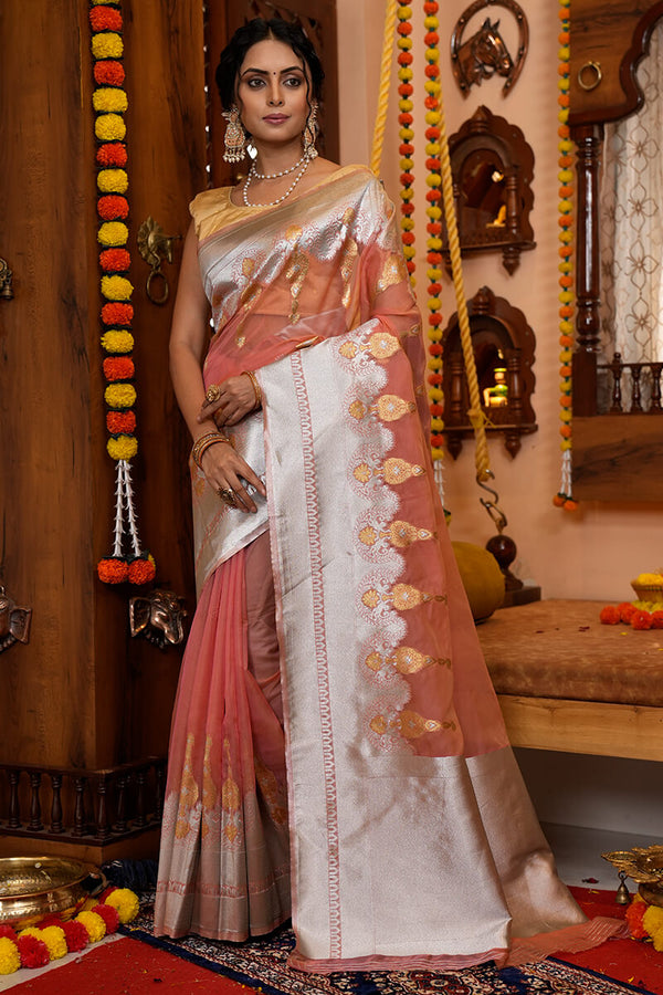 Glittering Peach Organza Silk Saree With Susurrous Blouse Piece Bvipul