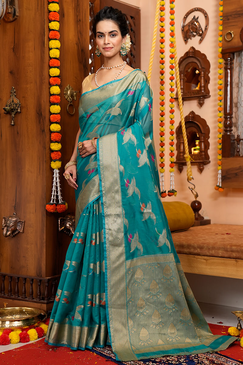 Girlish Firozi Organza Silk Saree With Demanding Blouse Piece Bvipul Main image