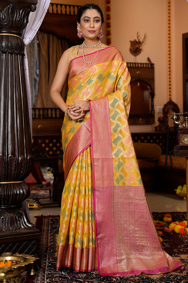 Entrancing Yellow Organza Silk Saree With Glittering Blouse Piece Bvipul Main image