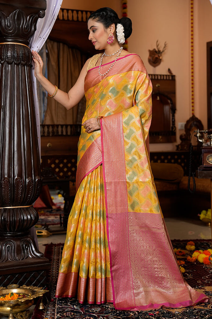 Entrancing Yellow Organza Silk Saree With Glittering Blouse Piece Bvipul