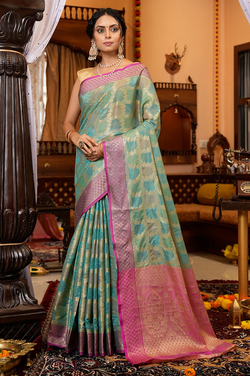 Cynosure Firozi Organza Silk Saree With Demesne Blouse Piece Bvipul Main image