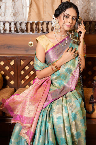 Cynosure Firozi Organza Silk Saree With Demesne Blouse Piece Bvipul