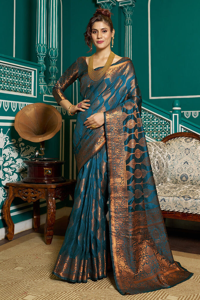 Twirling Rama Soft Banarasi Silk Saree With Entrancing Blous