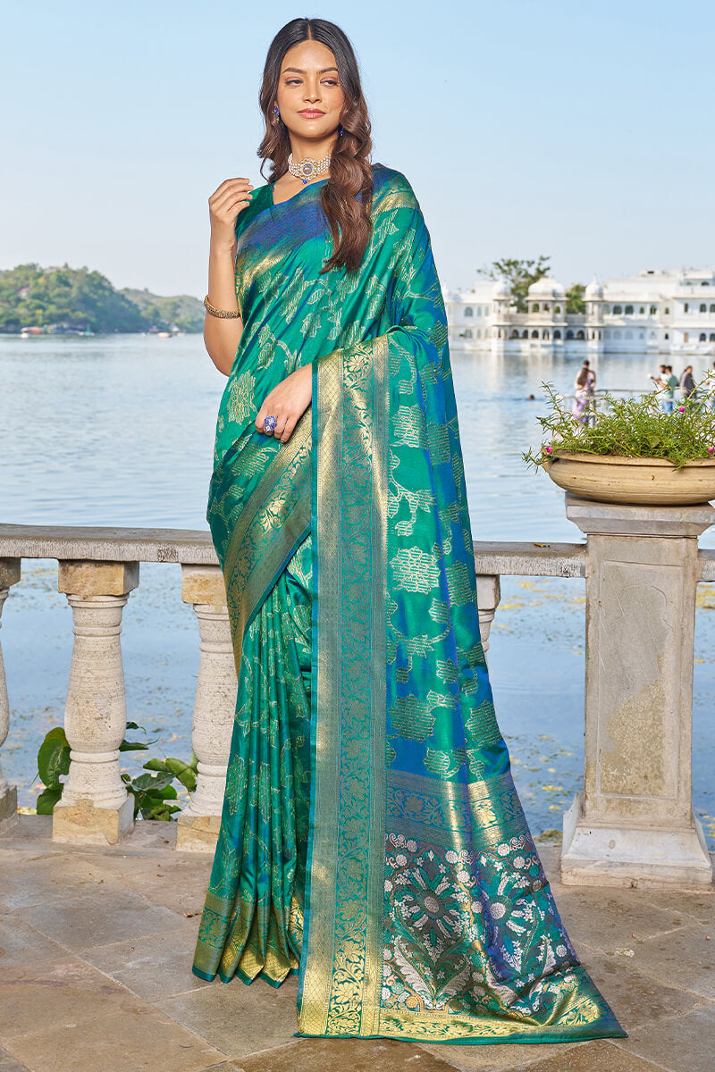 Jazzy Rama Kanjivaram Silk Saree With Engaging Blouse Piece Bvipul Main image