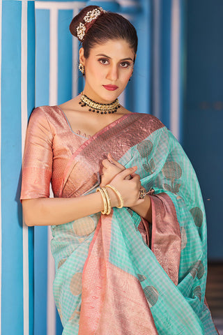 Luxuriant Sea Green Organza Silk Saree With Fantabulous Blouse Piece Bvipul