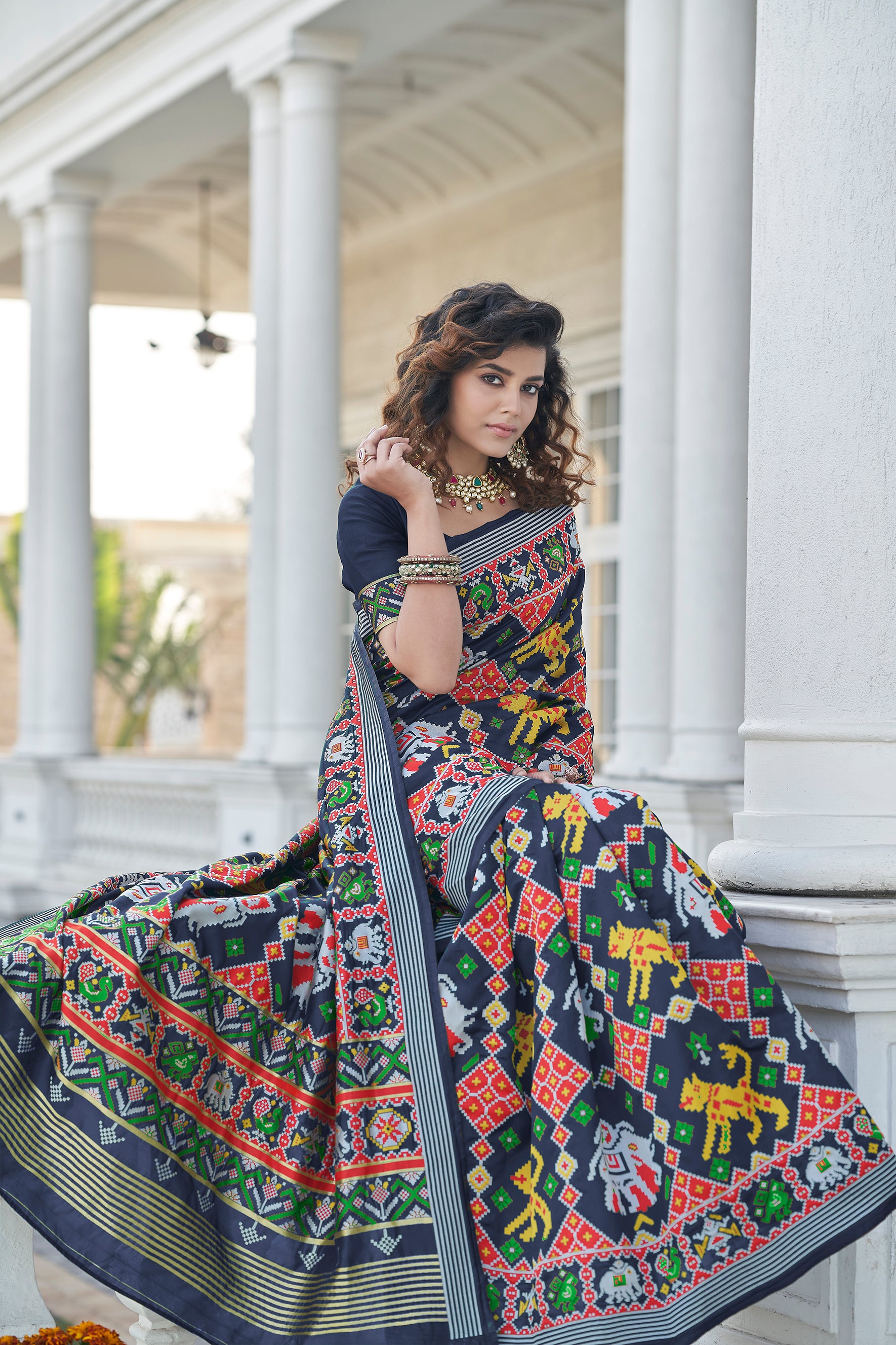 Beautiful Weaving Work Sangeet Wear Navy Blue Color Patola Style Saree In Art Silk Fabric ClothsVilla