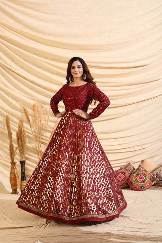 Decent Maroon Color Taffeta Silk Base Foil Print Base Partywear Gown ClothsVilla