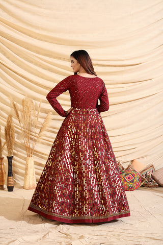 Decent Maroon Color Taffeta Silk Base Foil Print Base Partywear Gown ClothsVilla