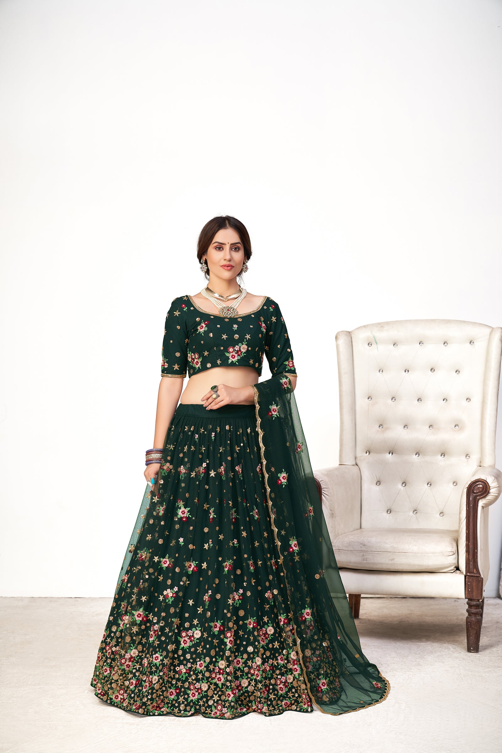 Delightful Green Net Thread And Sequins Embroidered Lehenga ClothsVilla