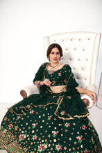 Load image into Gallery viewer, Delightful Green Net Thread And Sequins Embroidered Lehenga ClothsVilla