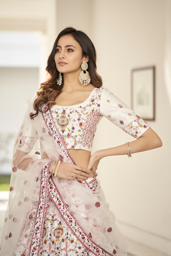 Fascinating White Embroidered Silk Party Wear Lehenga Choli ClothsVilla