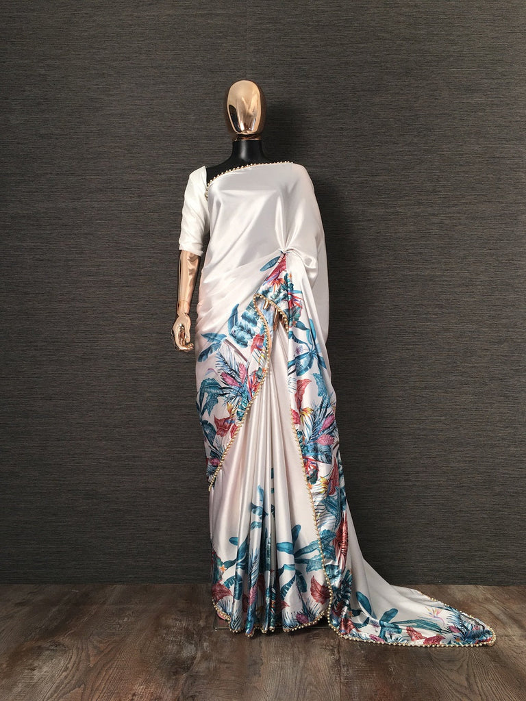 White Color Floral Printed Japan Satin Silk Saree With Pearl Lace Border Clothsvilla