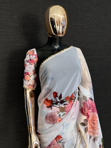 White Color Floral Digital Printed Georgette Saree With Pearl Lace Border Clothsvilla