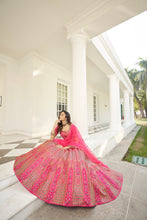 Load image into Gallery viewer, Hypnotizing Deep Pink Thread And Sequins Embroidered Silk Semi Stitched Lehenga ClothsVilla