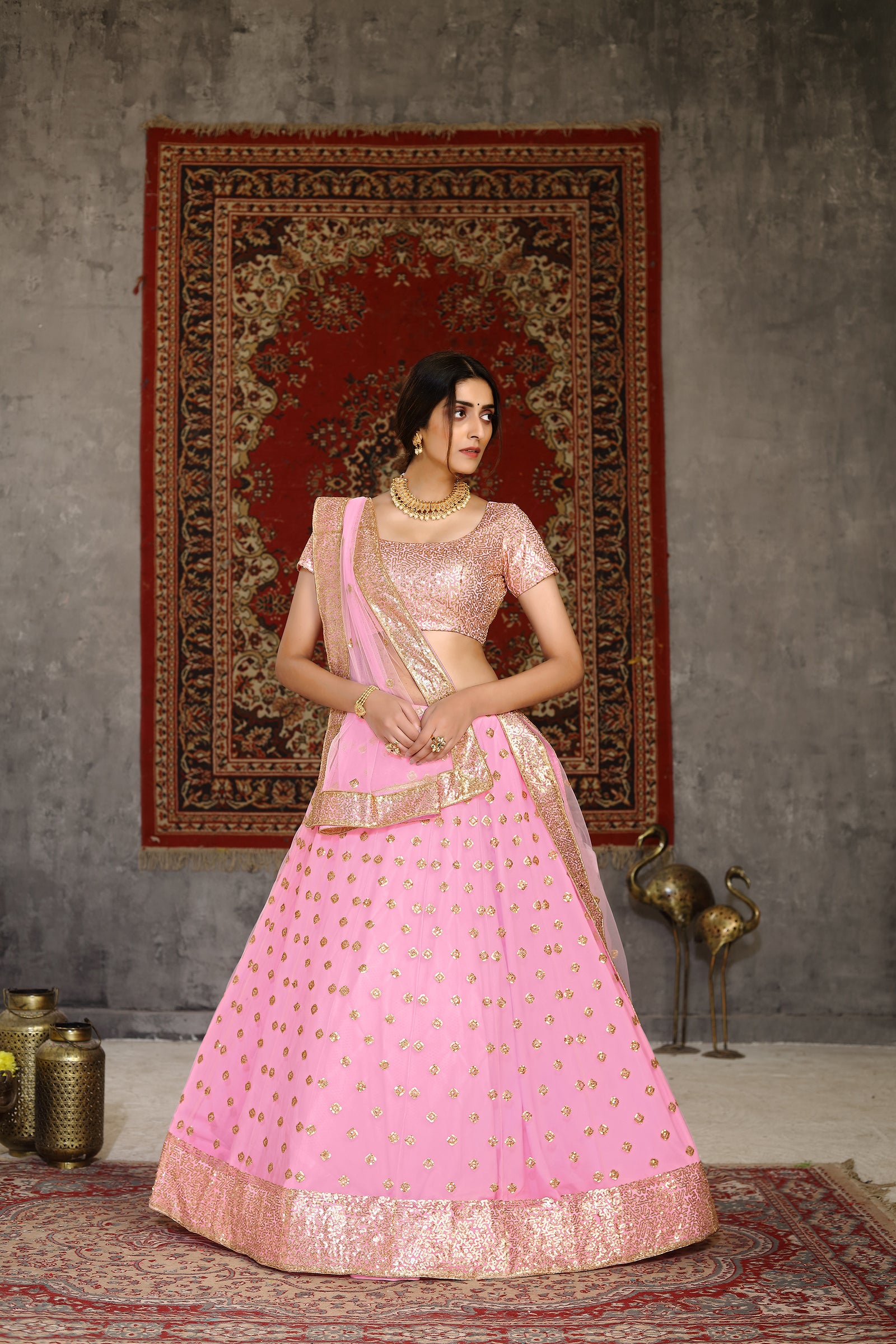 Hypnotizing Pink Sequins Embroidered Net Semi Stitched Lehenga Choli ClothsVilla