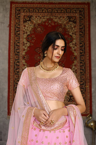 Hypnotizing Pink Sequins Embroidered Net Semi Stitched Lehenga Choli ClothsVilla