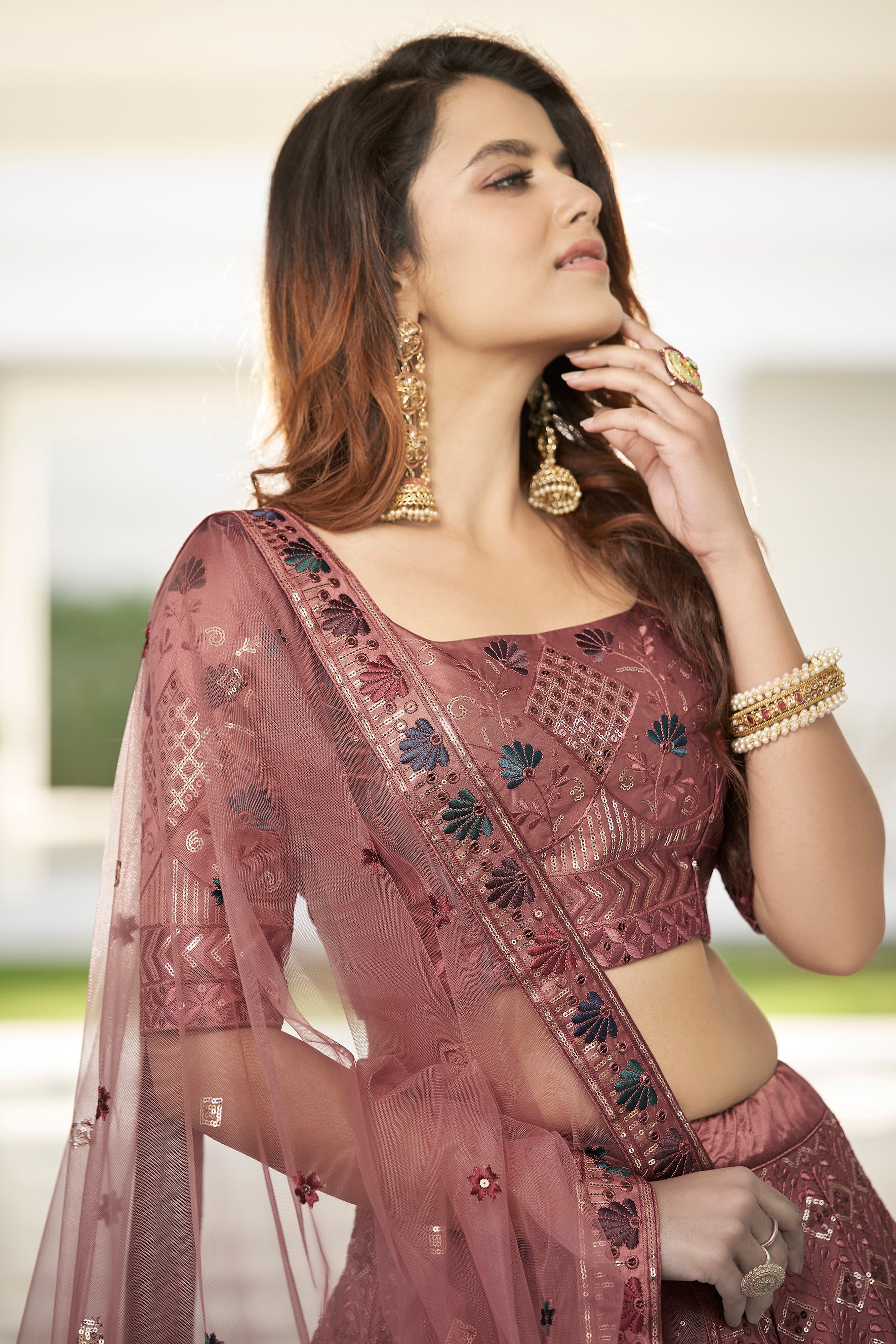 Invaluable Rust Orange Sequins Embroidered Silk Party Wear Lehenga Choli ClothsVilla