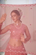 Load image into Gallery viewer, Irresistible Dusty Pink Thread With Sequins Embroidered Net Wedding Lehenga Choli ClothsVilla