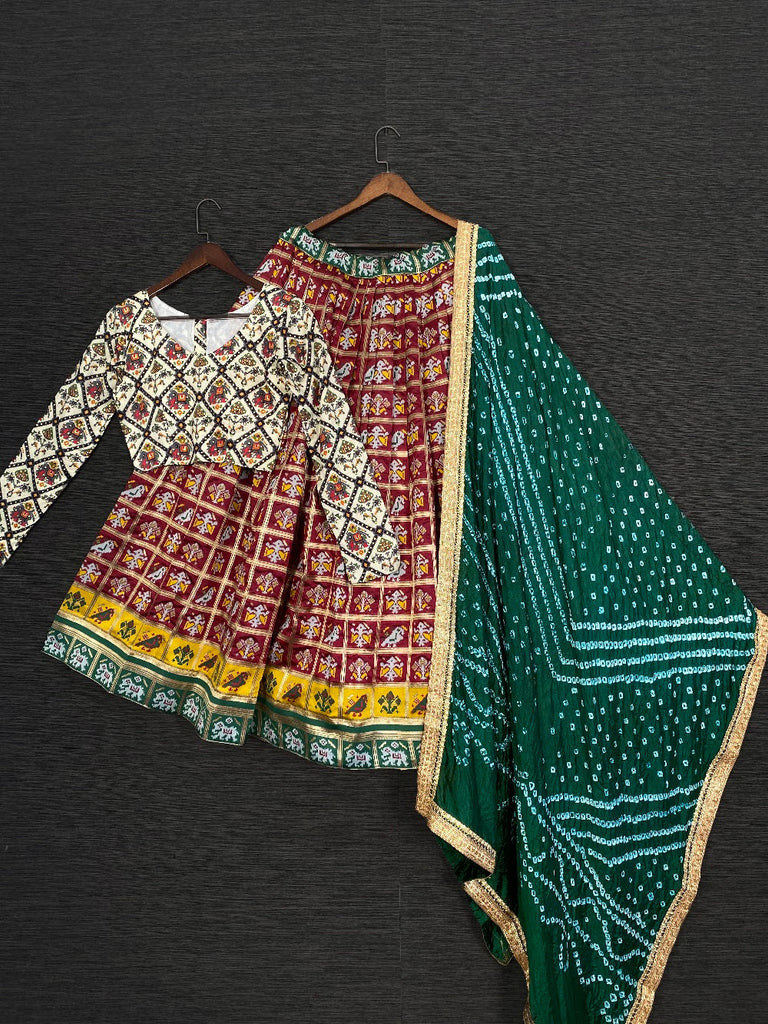 Maroon Color Jacquard Patola Navratri Lehenga Choli With Bandhej Dupatta Clothsvilla
