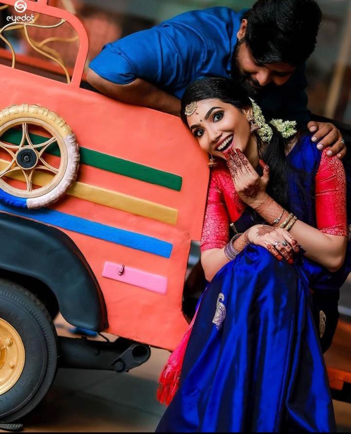 Photo of A south indian couple pose for the camera