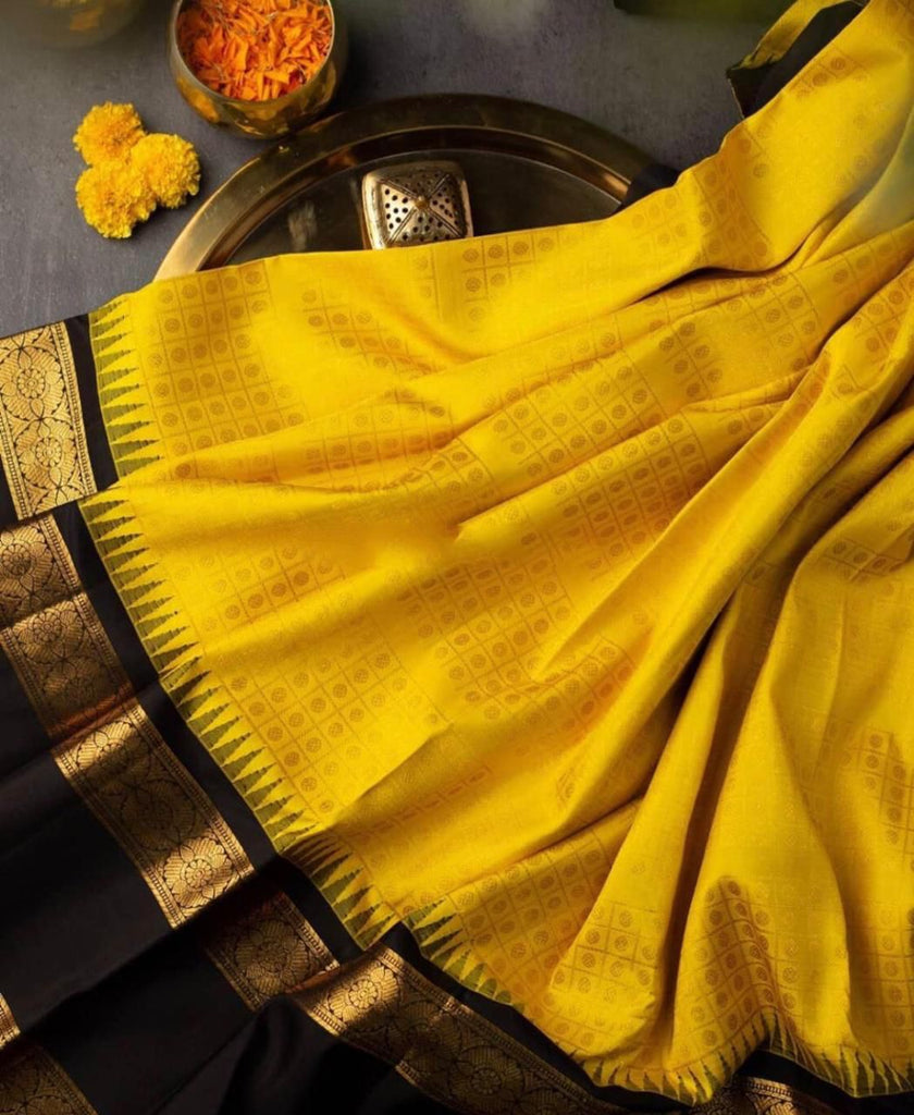 Sizzling Yellow Soft Banarasi Silk Saree With Magnetic Black Blouse Piece KP