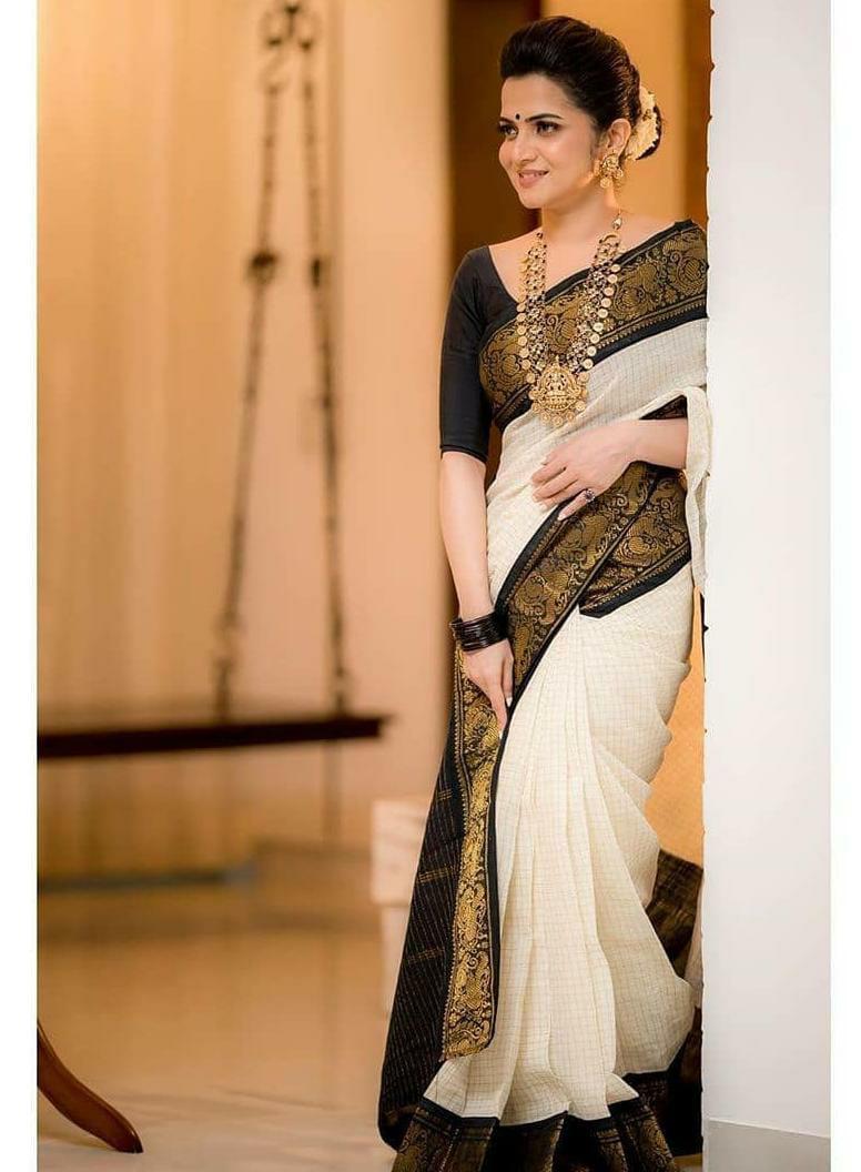 Twirling Off White Soft Banarasi Silk Saree With Panoply Blouse Piece KP Main image