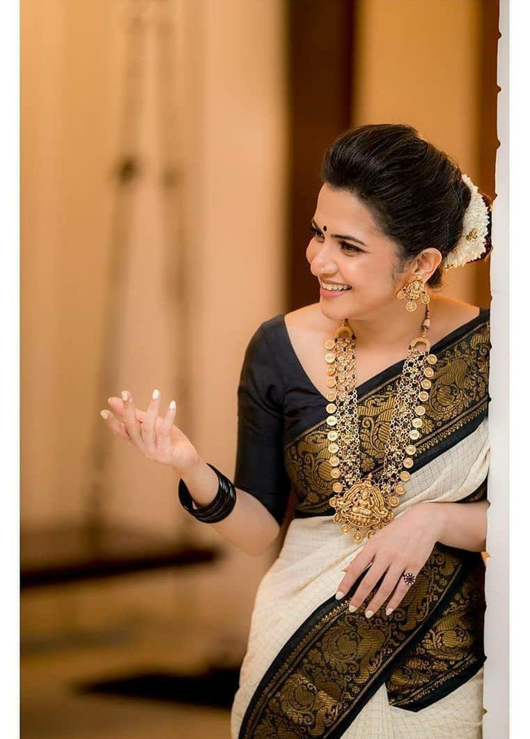 Twirling Off White Soft Banarasi Silk Saree With Panoply Blouse Piece KP