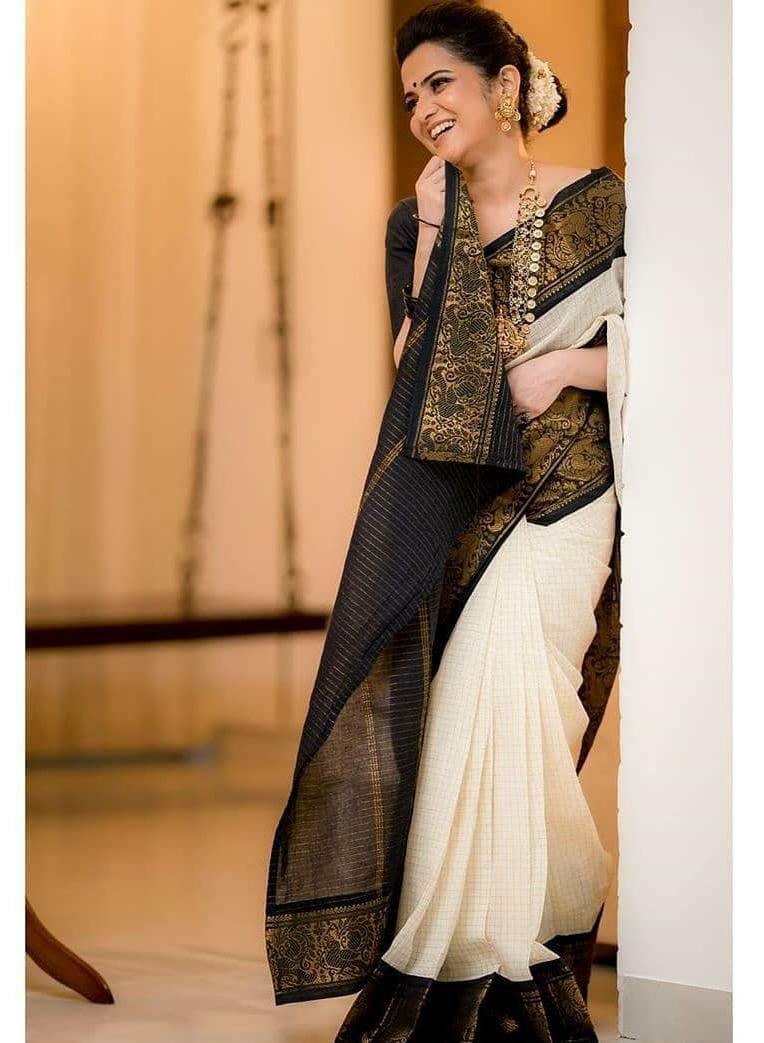 Twirling Off White Soft Banarasi Silk Saree With Panoply Blouse Piece KP