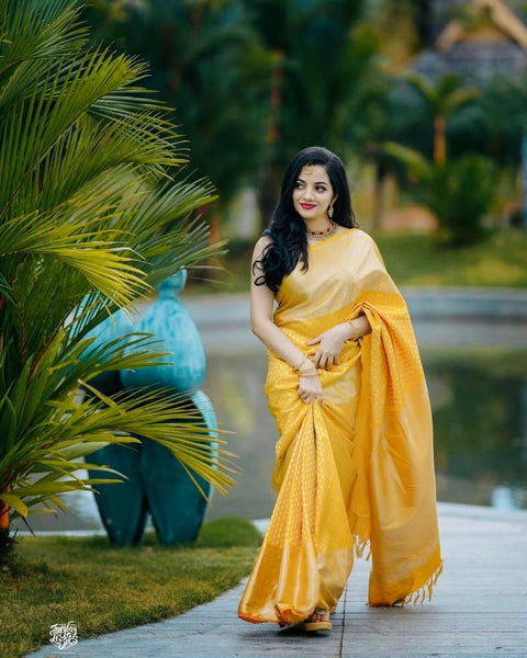 Glittering Yellow Soft Banarasi Silk Saree With Sensational Blouse Piece KP Main image