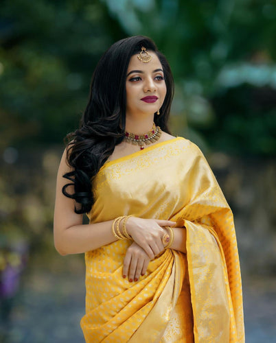 Glittering Yellow Soft Banarasi Silk Saree With Sensational Blouse Piece KP