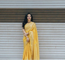 Load image into Gallery viewer, Glittering Yellow Soft Banarasi Silk Saree With Sensational Blouse Piece KP