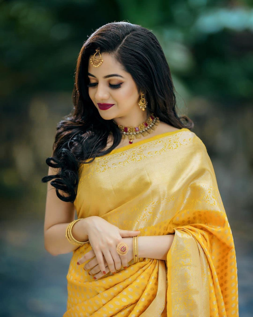 Glittering Yellow Soft Banarasi Silk Saree With Sensational Blouse Piece KP