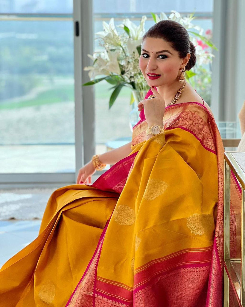 Yellow Handcrafted Banarasi Silk Saree with Red Pallu and Zari Weaving