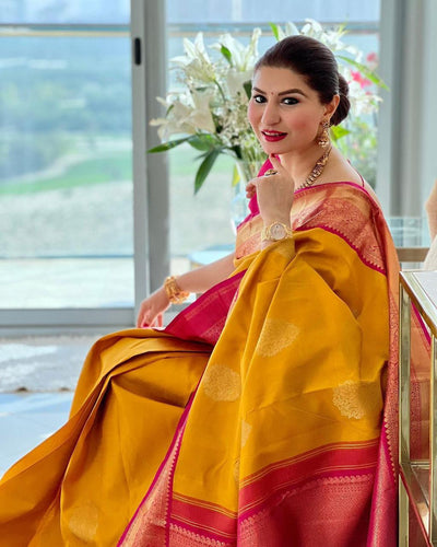 Dissemble Yellow Soft Banarasi Silk Saree With Blissful Blouse Piece KP
